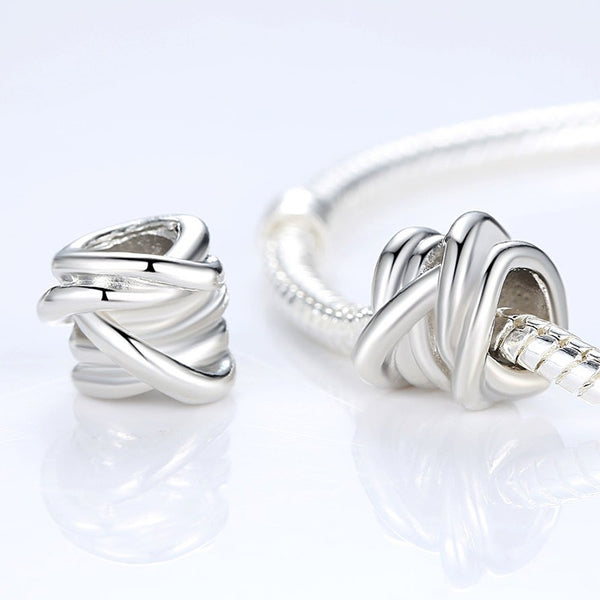 Winding Silver Thread Charm
